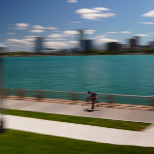 Spring 2026 Riverwalk Cyclist in Motion
